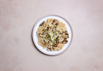 Risotto with mushrooms, cheese and thyme. Vegetarian food. Italian food.