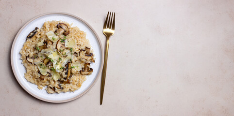 Risotto with mushrooms, cheese and thyme. Vegetarian food. Italian food.