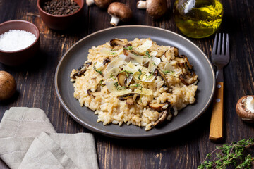 Risotto with mushrooms, cheese and thyme. Vegetarian food. Italian food.
