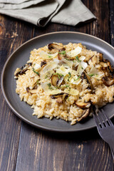 Risotto with mushrooms, cheese and thyme. Vegetarian food. Italian food.