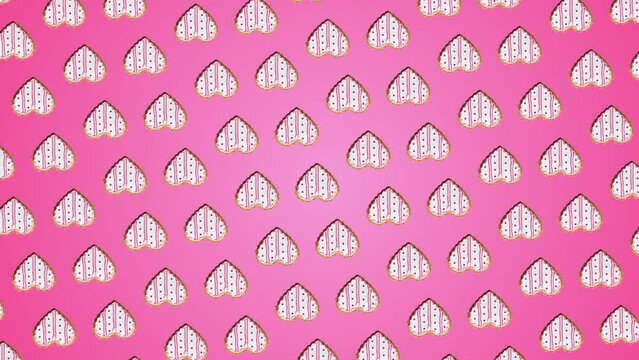 This stock motion graphics video shows a moving pattern background of Ginger cookie in shape heart on pastel pink icing. 3 in 1 animation: a different sides and size Rotating Background is a tessellat