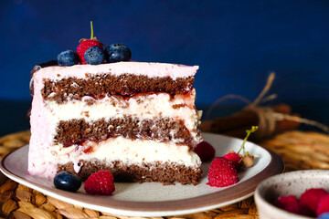 Close up Piece of cake, chocolate sponge cake biscuit with cream cheese.