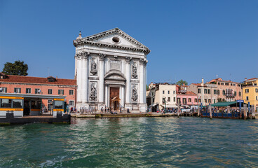 View of the old Dominican church Gesuati (Santa Maria del Rosario) on the waterfront Zaterre of the Giudecca canal. Venice, Italy - obrazy, fototapety, plakaty