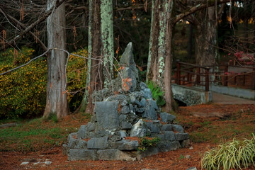 Mystical forest. Japanese garden. Sculpture made of stones.