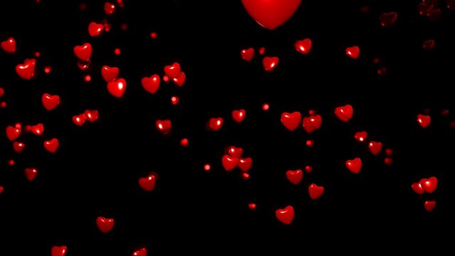 Red hearts in different sizes moving against a black background. Romantic and valentine concept. 3D animation. 