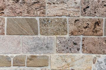 The texture of the stone wall. Background texture of the stone wall of the old castle.