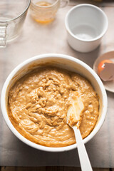 Preparing banana bread batter. With bananas, flour, eggs, maple syrup, brown sugar, cinnamon 
