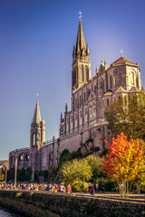 Fototapeta na wymiar Pilgrimage Center. Sanctuary in Lourdes. Shrine in France. Way of St. James. Notre Dame de Lourdes. Catholic Basilica. Stone church. Saint Bernadette. Nun Bernadette Soubirous.