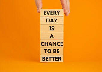 Chance to be better symbol. Wooden blocks with words Every day is a chance to be better. Beautiful...