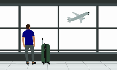 A male character with suitcase stands in an airport building and looks out the window at an airplane taking off
