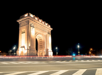 Fototapeta na wymiar The Arch of Triumph (Arcul de Triumf) in Bucharest is closely modelled after the Arc de Triomphe from Paris. located in the Northern part of Bucharest.