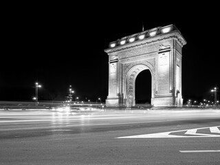 Fototapeta na wymiar The Arch of Triumph (Arcul de Triumf) in Bucharest is closely modelled after the Arc de Triomphe from Paris. located in the Northern part of Bucharest.
