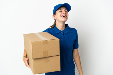 Young delivery woman isolated on white background laughing
