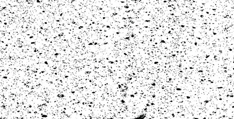 Small uneven spots and particles of debris. Abstract vector texture. Distressed uneven background. Grunge texture overlay with fine grains isolated on white background. Vector illustration. EPS10.