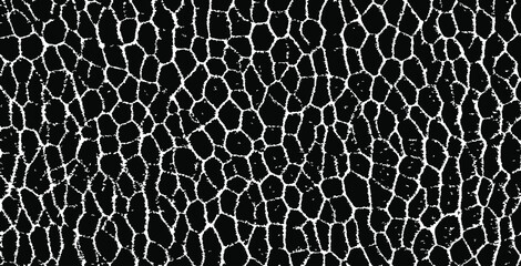 Small uneven spots and particles of debris. Abstract vector texture. Distressed uneven background. Grunge texture overlay with fine grains isolated on white background. Vector illustration. EPS10.