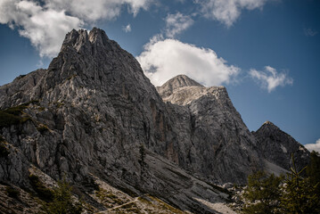 Horizontal photo of both Mala and Velika Mojstrovka in Julian Alps from a late summer hike.