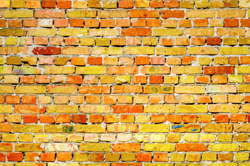 Vibrant brick wall texture pattern stone masonry background. Old brickwork texture. Backdrop texture masonry wall brick background. Old yellow brick texture rough masonry backdrop or brickwork pattern