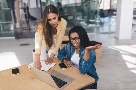 Business women working in open space office