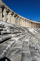seats of well preserved Roman theatre in ancient city Aspendos, Turkey