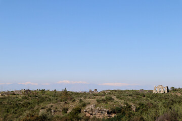 Fototapeta na wymiar panoramic view to the ruins of the ancient city Aspendos center with agora and basilica