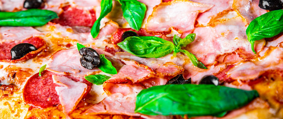 Obraz na płótnie Canvas flatbread Pepperoni Pizza with Mozzarella cheese, salami, ham, Tomato sauce, pepper, Spices. Italian pizza on wooden background