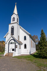 Fototapeta na wymiar The Phoenix Church of the Assumption, in Carpenter Gothic style, in Michigan Upper peninsula