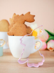 Easter background. Happy Easter eggs in the nest. Easter eggs. Rabbit. Cookies. copy space