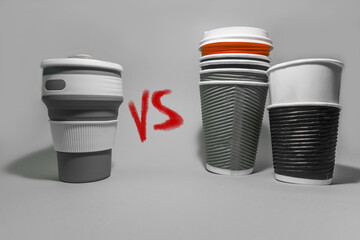  Reusable coffee cup vs paper disposable coffee cups. Conscious consumption. Caring for the environment. High quality photo