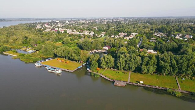 Flight over the city of Vylkovo Ukraine in the south. City by the Danube river. morning landscape from aerial view. City near the big river.