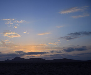 Sunset with blue sky and scattered clouds, Lanzarote, Canary Islands, Spain