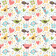 Seamless pattern with cute birds and hearts.