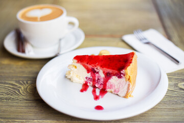 Delicious and beautiful cheesecake with strawberry jam