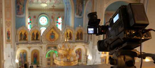 television camera in an orthodox church , television broadcasts