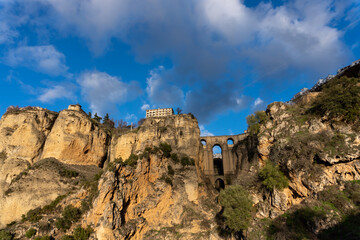 Fototapeta na wymiar Panoramic view of cliffs and a medieval bridge