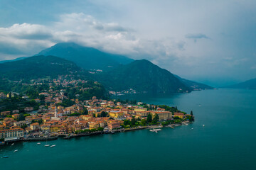 Aerial view of Menaggio village on a coast of Como lake, Italy on a cloudy day