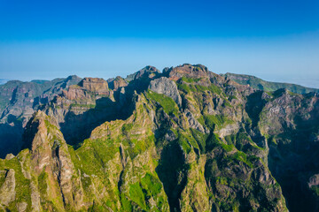 Aerial view of the mountains range in Madeira Island during a sunset