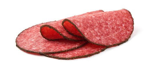 Pepper salami slices, isolated on white background.