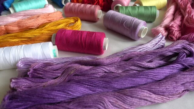 A top view of colorful mouline threads and multicolored