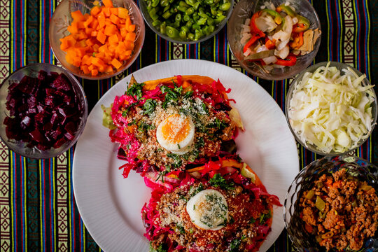 Enchilada Guatemalteca displayed with its ingredients 