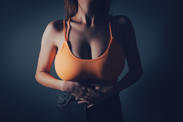 a young girl has a stomach ache