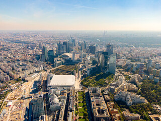 Fototapeta na wymiar Establishing Aerial Panorama of Paris Downtown with Skyscrapers and Office Buildings on daytime. Skyline and Cityscape of Capital of France. Modern Business Architecture Background