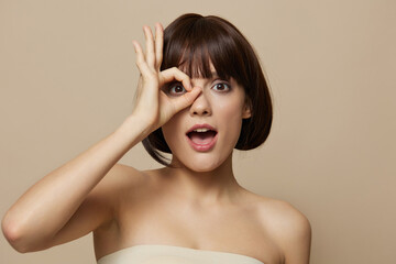 Fototapeta premium young woman hand near face body care model makeup close-up Lifestyle