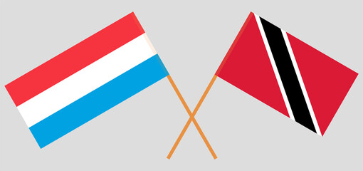 Crossed flags of Luxembourg and Trinidad and Tobago. Official colors. Correct proportion