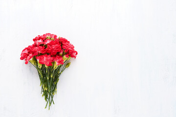 Red carnation flowers bouquet. Mothers Day, Valentines Day, birthday celebration concept