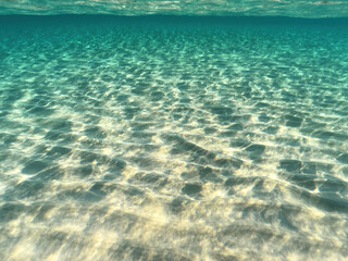 Underwater split photo of paradise beach of Simos in island of Elafonisos, Lakonia, Greece