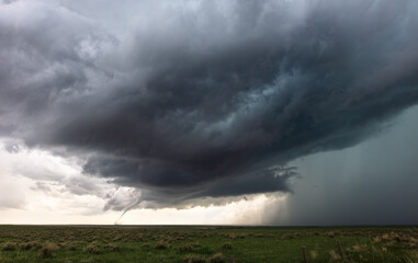 Obraz na płótnie Canvas Tornado and ominous storm clouds