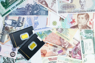 Various currencies. Banknotes, money, gold bars from different countries. Diversification of the...