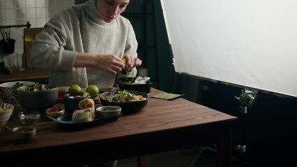 Shooting of cooking traditional korean chinese food, food stylist working. Japanese Ramen with Beef or chicken, rice noodles with fried meat, Tom Yam kung Spicy Thai asian soup.