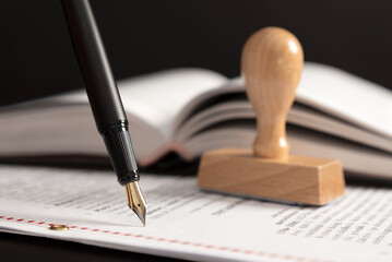 Agreement concept with fountain pen and documents