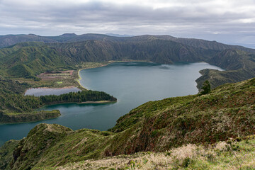 Obraz na płótnie Canvas Panoramic view of the Lagoa do Fogo in the volcanic caldera of the Agua de Pau volcano in the Sao Miguel island (Azores, Portugal)